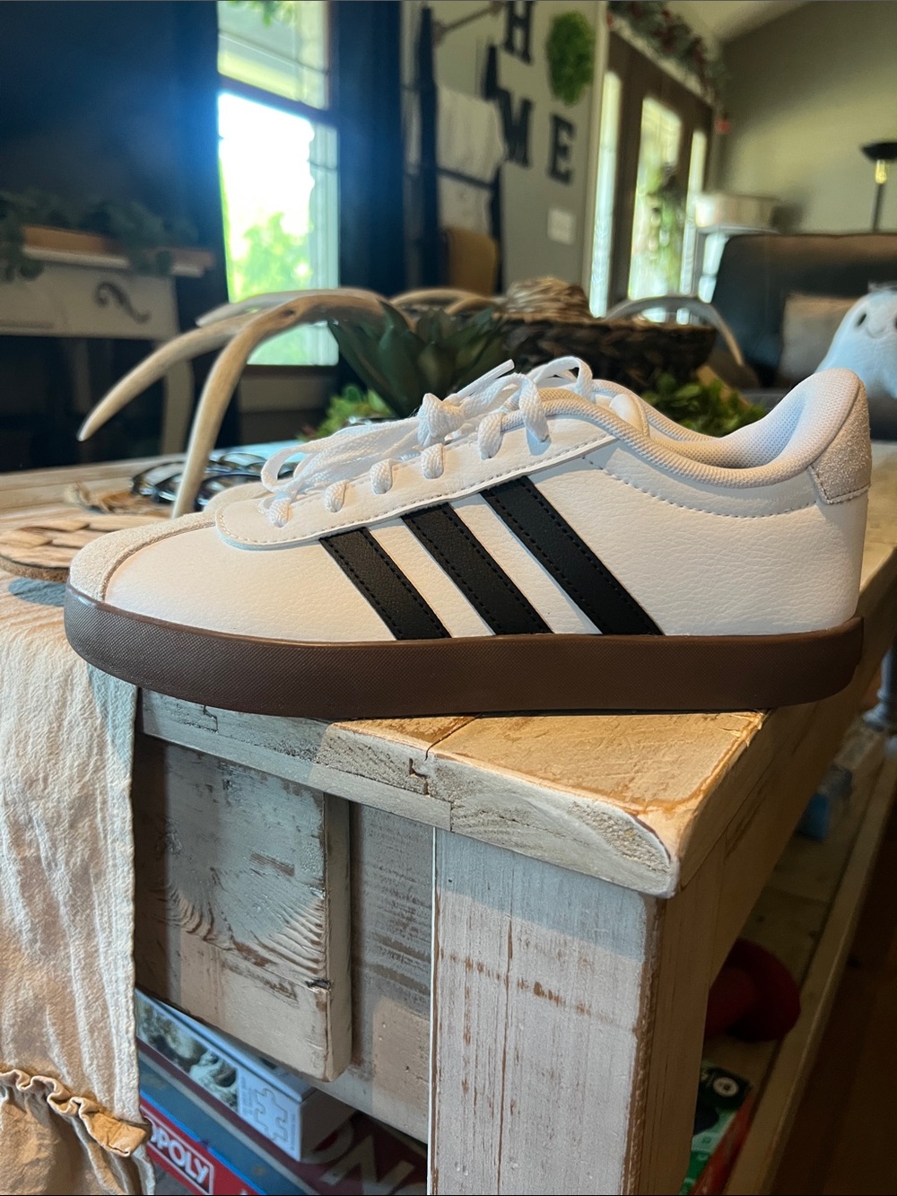 adidas White Sneakers with Black Stripes and Brown Sole
